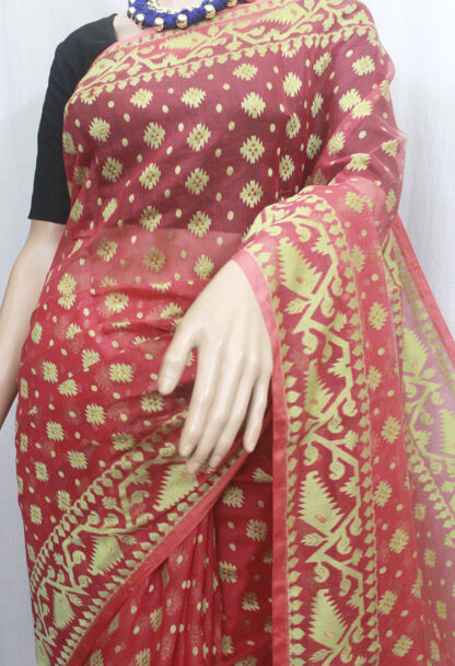 This red-based body with pista green buta and karat jamdani work border and pallu saree make you beautiful, and attractive and they have a fantastic fall.